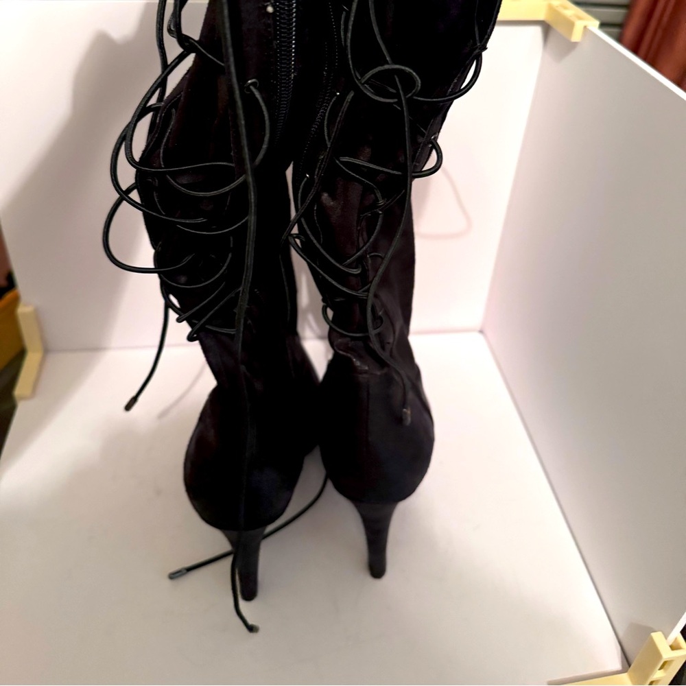 BCBG  zip and lace up heeled boot, feels like soft pony hair but is fabric.